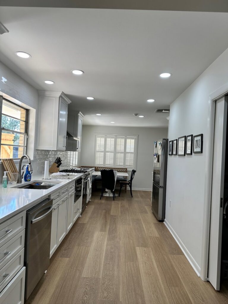 Newly installed recessed lighting in a modern kitchen by LiveWire Electrical Services, LLC. in Houma, LA.