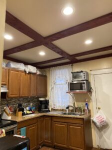 A kitchen with new recessed lighting installed in the ceiling by Omni Electrical Services LLC in Philadelphia, PA.