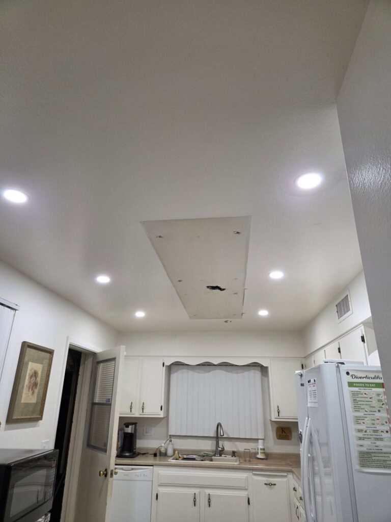 Bright kitchen ceiling with newly installed recessed lighting by Sparks By Rabbit LLC in Scottsdale, AZ.