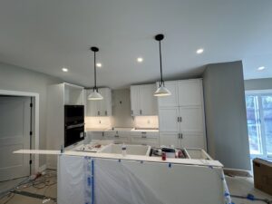 New kitchen with recessed and pendant lighting installed during construction by Electric R US LLC in Dearborn, MI.