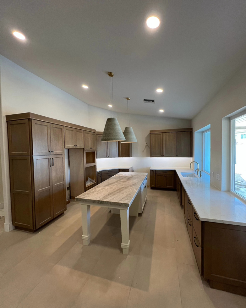 Kitchen remodel featuring new recessed and pendant lighting installed by Silo Electric in Gilbert, AZ