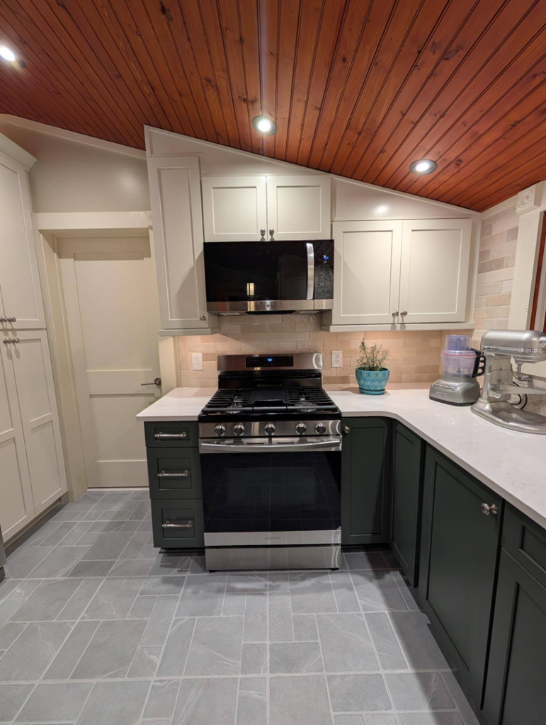 Kitchen stove area with new recessed and under-cabinet lighting by J Turner Electric LLC in Indianapolis, IN.