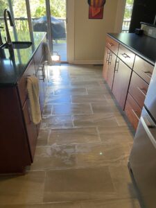 Kitchen with new tile flooring installed by Mendez Carpet in Grand Rapids, MI.