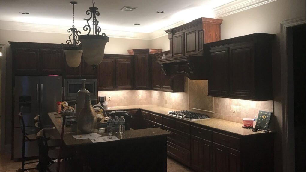 Kitchen with new under-cabinet lighting and a chandelier installed by Steadfast Electric, LLC in Baton Rouge, LA.