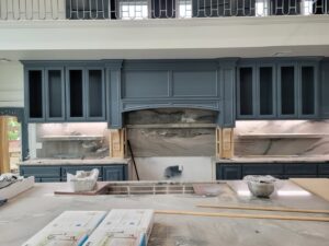 A kitchen under construction showing under-cabinet lighting and electrical rough-ins by Warner Electric Service, LLC in Broken Arrow, OK.