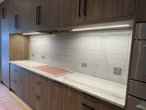 Kitchen counter with new under-cabinet lighting and wall outlets installed by Nech Electric Services Inc. in Chicago, IL.