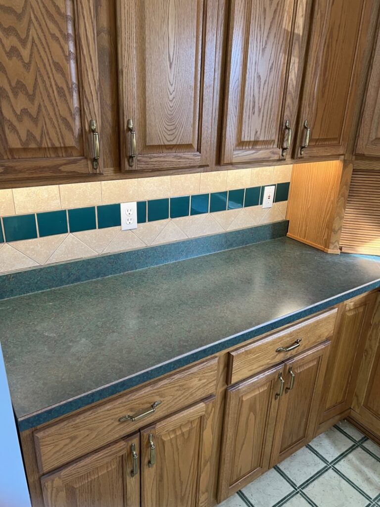 Kitchen under-cabinet lighting and electrical outlets installed by Pinnacle Electric Solutions in Port St. Lucie, FL.