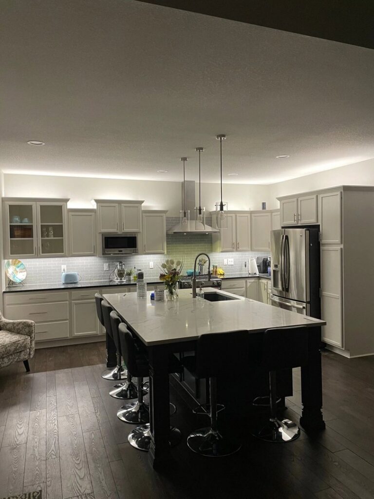 Kitchen with under-cabinet, pendant, and recessed lighting installed by Innovative Electric in Wichita, KS.