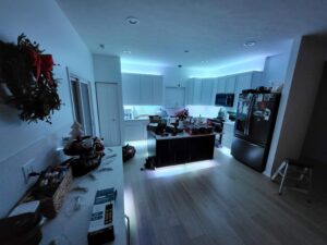 Modern kitchen featuring under-cabinet and recessed ceiling lighting installed by Electrifying Services in Indianapolis, IN