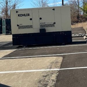 Large Kohler commercial generator installed in a parking lot by Blevens Electric LLC in Bowling Green, KY
