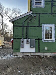 Kohler generator and electrical meter installation on a new home by Empower Electrical, LLC in Fall River, MA