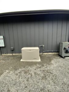 A Kohler home standby generator installed next to a house by Washington Generators LLC in Kent, WA.
