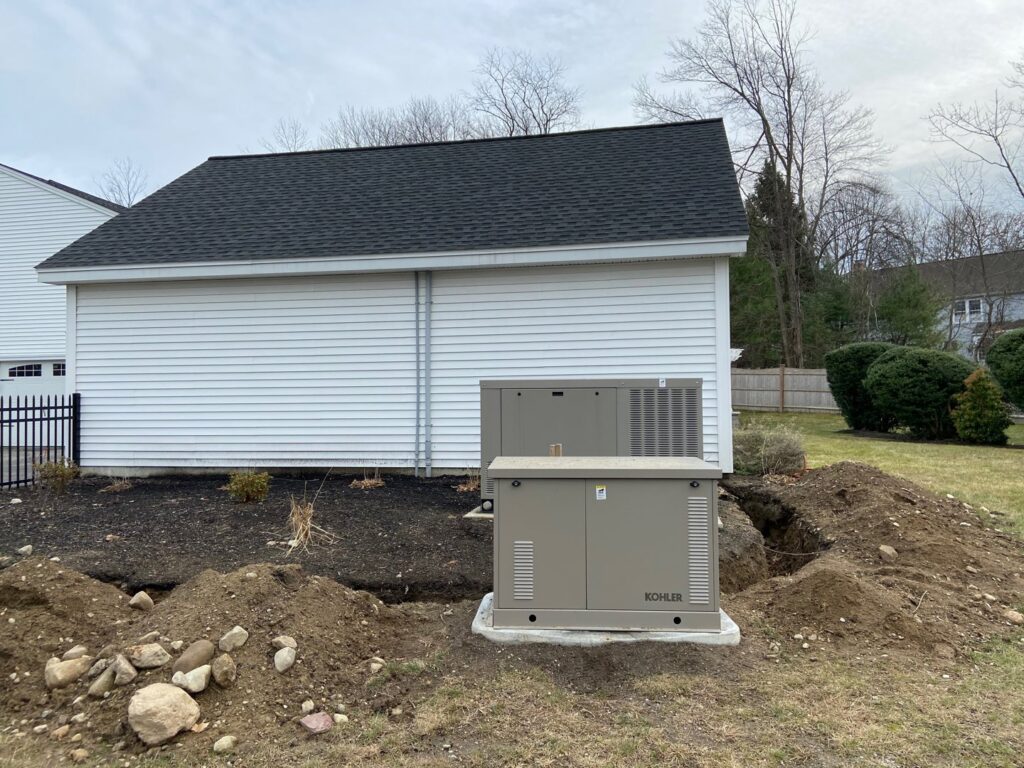 A Kohler standby generator installed outside a home by T.S.F Electric in Saco, ME.