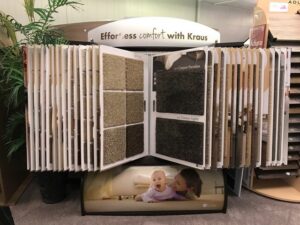A display featuring Kraus carpet samples in the showroom of BK The Floor Store of Nebraska in Columbus, NE.