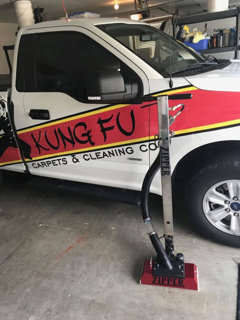 The Kung Fu Carpets & Cleaning Co. truck with a carpet cleaning wand, ready for a job in Meridian, ID.
