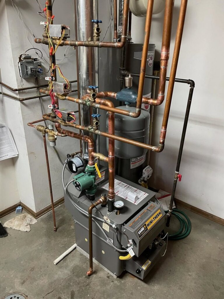 A Laars Mini-Therm boiler system with copper piping installed by National Heating & Cooling Company in Lakewood, CO.