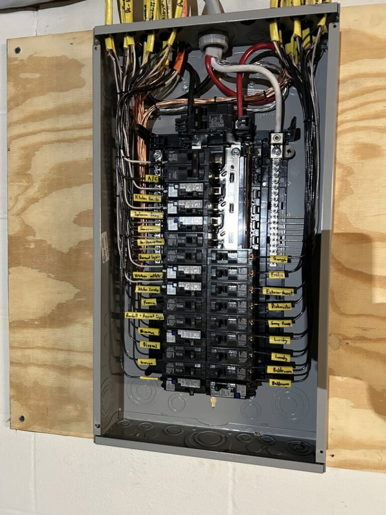 A neatly wired and labeled electrical breaker panel installed by Ardent Electric in Erie, PA.