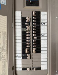 An open electrical panel with clearly labeled circuit breakers, demonstrating organized electrical work by Thevenin Electric in Corvallis, OR.