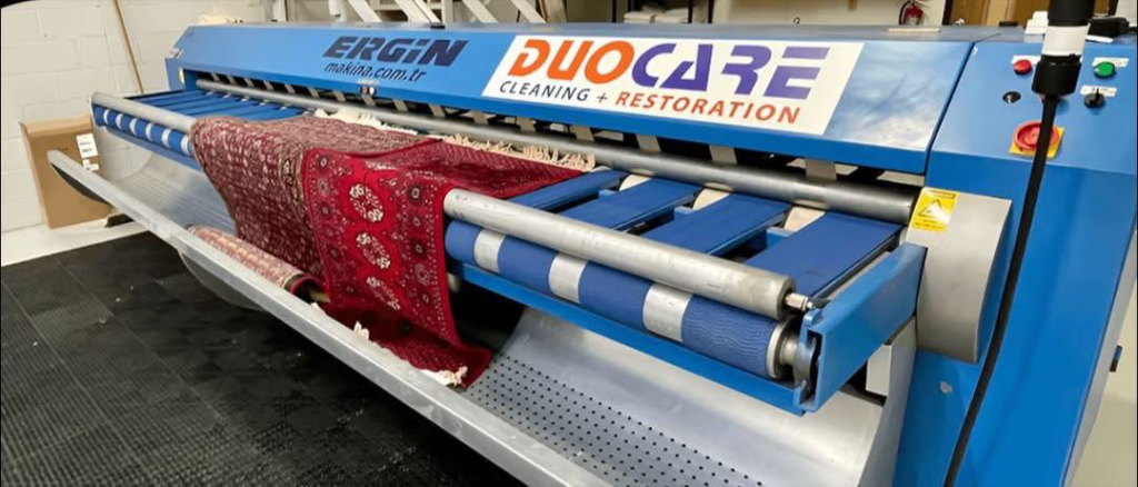 A large area rug being professionally cleaned by Duo-Care Cleaning and Restoration in Sterling Heights, MI