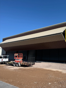 Large bifold garage door installation in progress by Mr. Garage Door in Bell Gardens, CA.