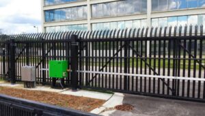 Large black security sliding gate with anti-climb spikes and automation by Gate Options in West Chicago, IL