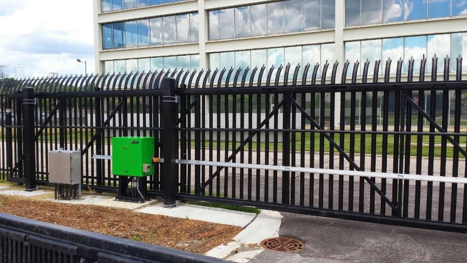 Large black security sliding gate with anti-climb spikes and automation by Gate Options in West Chicago, IL