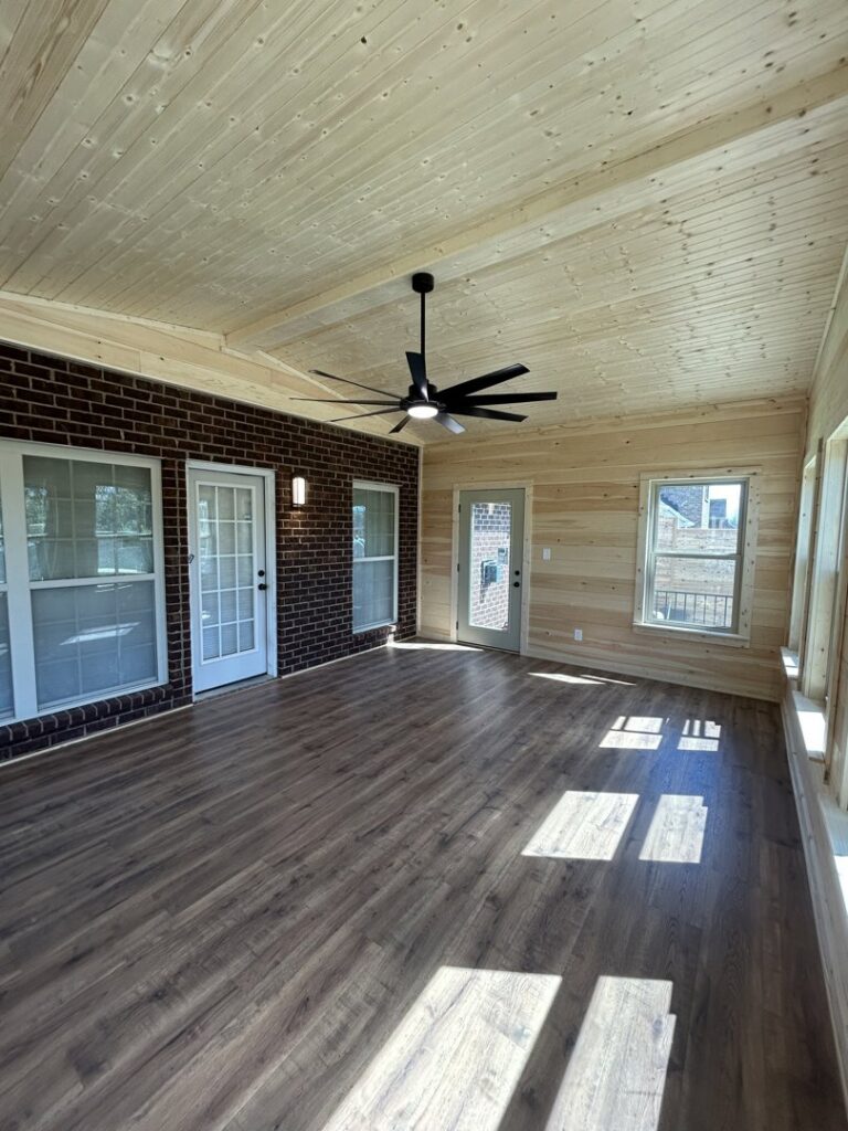 A large, modern ceiling fan installed in an indoor room by Top Tier Electrical Services LLC in Knoxville, TN