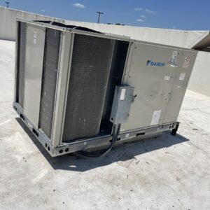A large commercial Daikin HVAC unit installed on a rooftop, maintained by T & T HVAC in Amherst, OH.