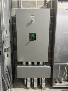 Installation of a large commercial electrical panel and conduit system by Russell Electric LLC in Saint Clair, MI