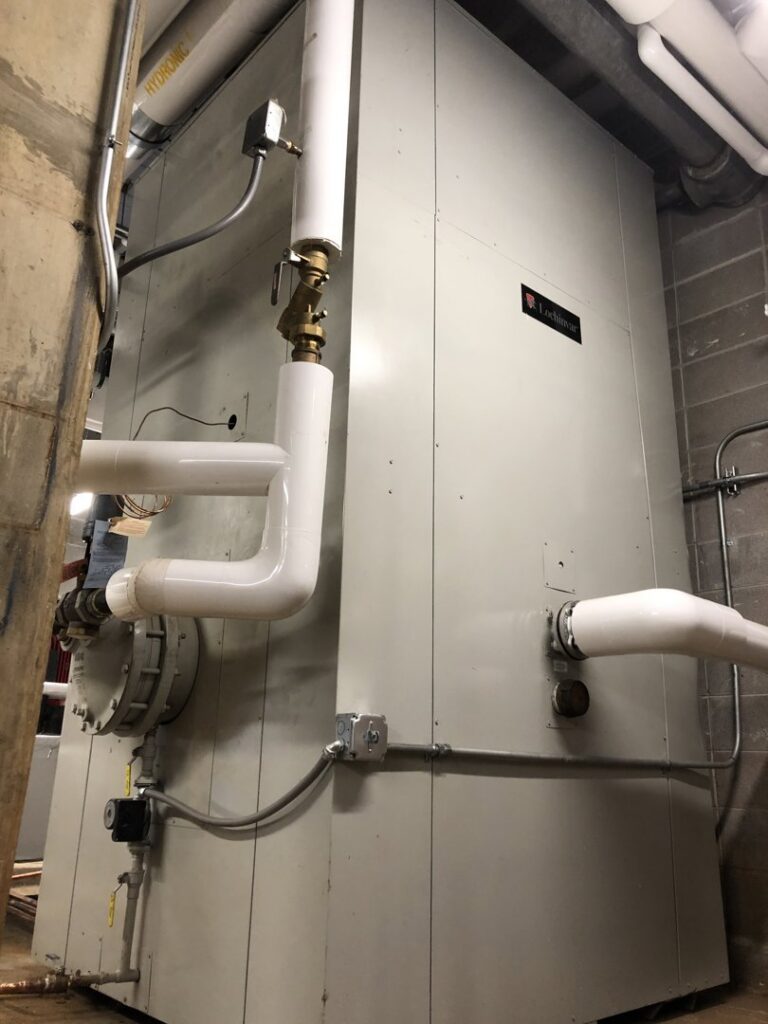 A large commercial HVAC boiler with hydronic piping installed by Jaco Sales, Inc. in Little Rock, AR.