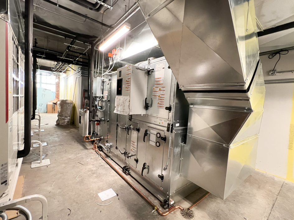 A large commercial HVAC system with extensive ductwork installed by Air Masters HVAC Services of New England, Inc. in Fall River, MA.