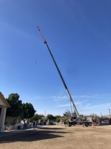 A large crane used for heavy HVAC unit installation by Advanced Comfort A/C & Heating in Phoenix, AZ.