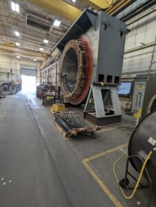 A large electric motor stator being serviced in an industrial shop, demonstrating the capabilities of Hannon Electric Company in Canton, OH.