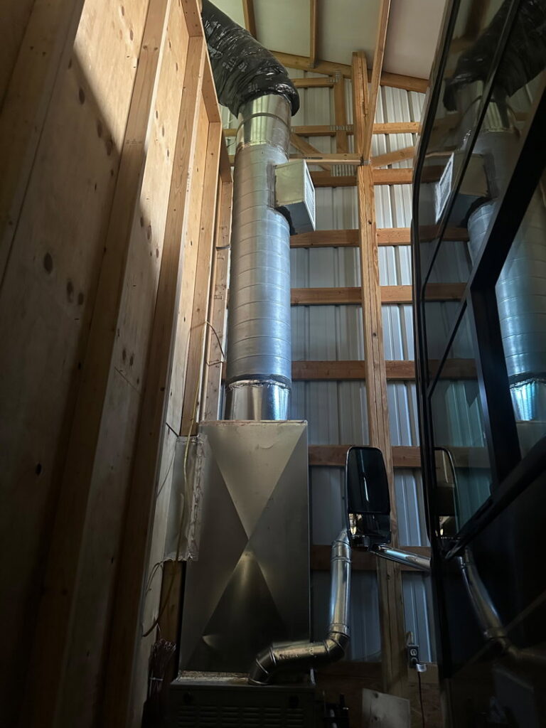 A large furnace and extensive ductwork installation in a building by All In One Home Services in Denver, CO.