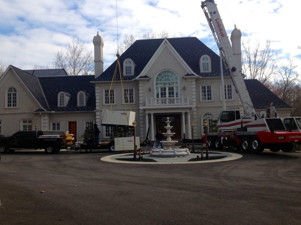 Large generator installation using a crane by Boyland Electric Inc. in Laytonsville, MD.