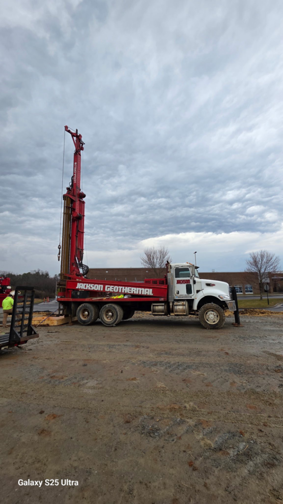A large geothermal drilling truck with its rig extended, ready for work by Jackson Geothermal in Mansfield, OH.