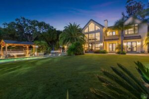 Large home exterior illuminated at dusk with professional lighting installed by R.C Electric, Inc. in San Francisco, CA
