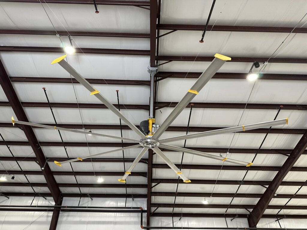 A large industrial ceiling fan, part of an HVAC system installation by Emergency Air in Chandler, AZ.