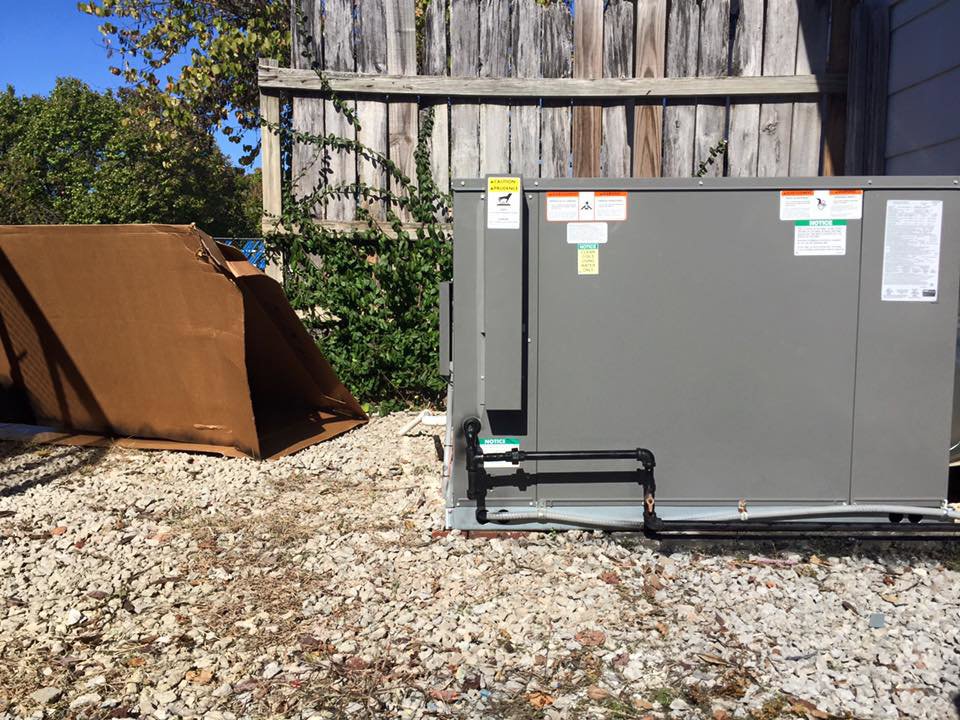 A large outdoor HVAC unit installed on a gravel pad by A&A HVAC and Electrical LLC in Nashville, TN.