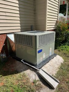 A large outdoor packaged HVAC unit installed next to a residential building by On-Target Heating & Air LLC in Rock Hill, SC.