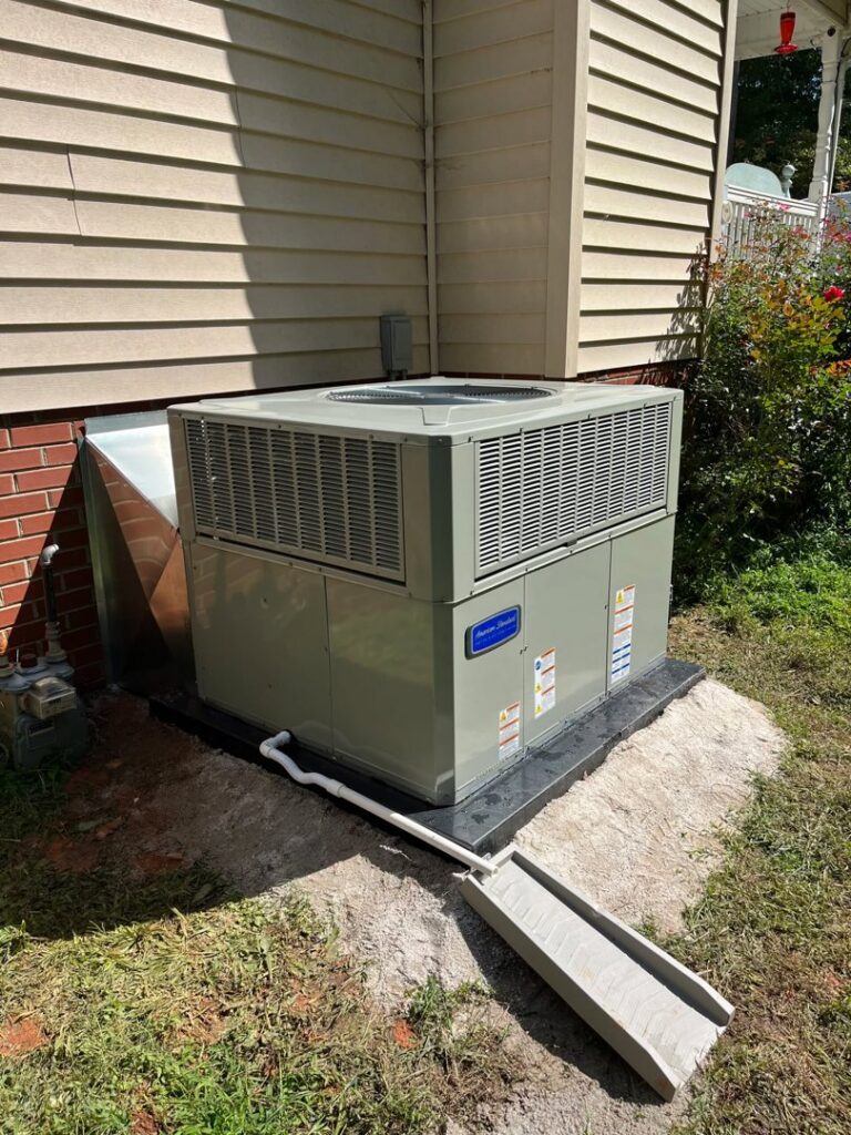 A large outdoor packaged HVAC unit installed next to a residential building by On-Target Heating & Air LLC in Rock Hill, SC.