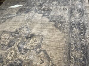 A close-up of a large, clean patterned area rug, professionally cleaned by Clear Vision Carpet & Floor Care, Inc. in Newnan, GA.