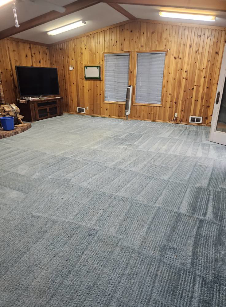 A large room with a light blue carpet that has been professionally cleaned by Super Clean Carpet Cleaning in Idaho Falls, ID.