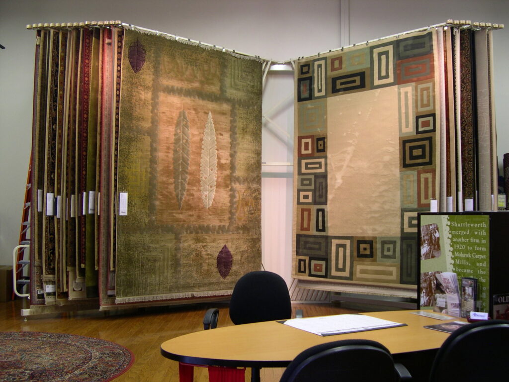 Large decorative rugs displayed in the showroom at Craft Rug Mills in Easton, PA.