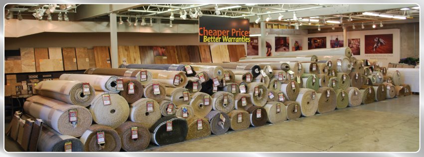 A large selection of carpet rolls displayed in the showroom at Taylor Carpets & Flooring in Provo, UT