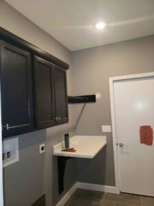 An electrical outlet installed in a laundry room by Fiedler Electric in Higginsville, MO.