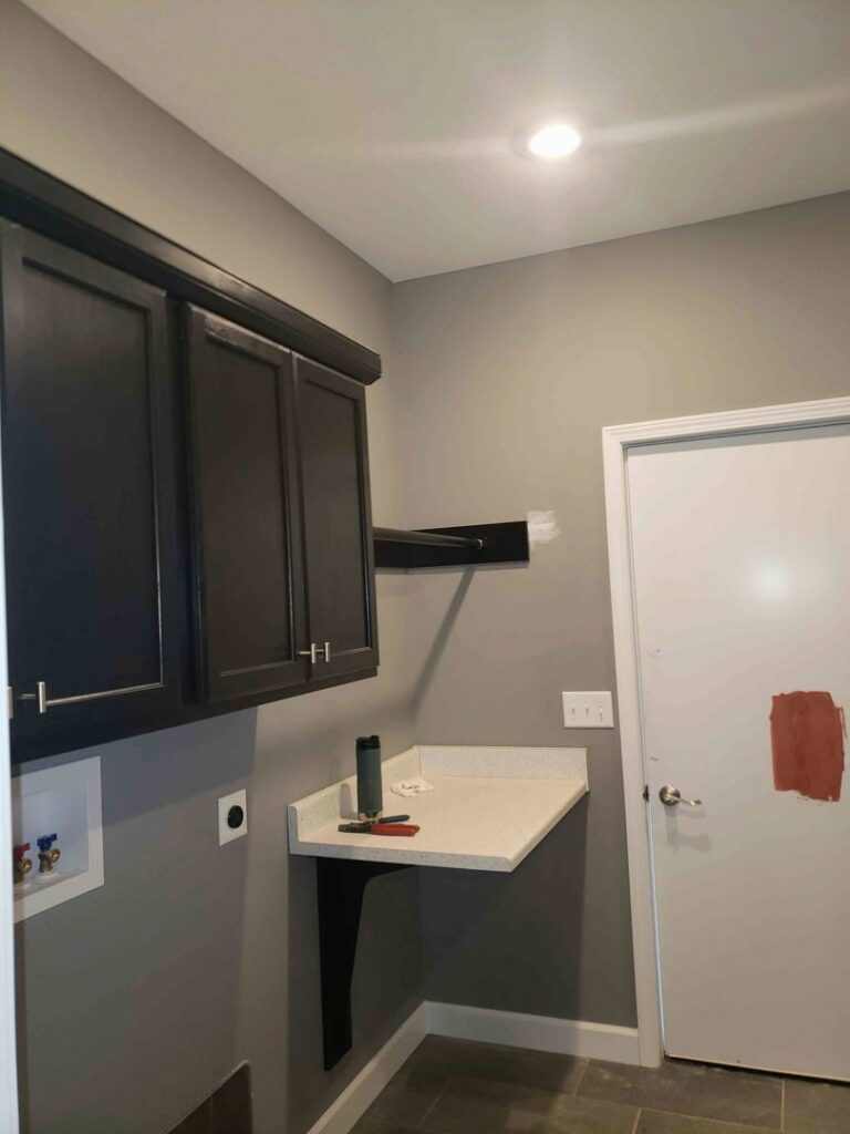 An electrical outlet installed in a laundry room by Fiedler Electric in Higginsville, MO.