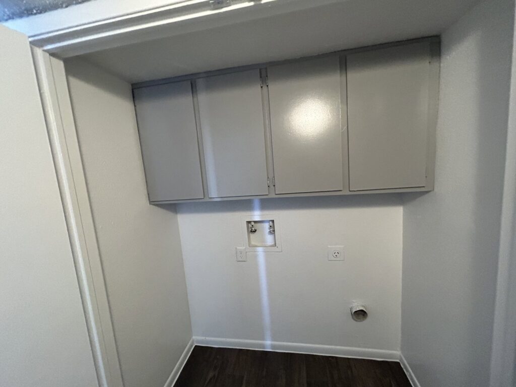 Newly installed electrical outlets and appliance hookups in a laundry room by Partners Electrical Services in Houston, TX.