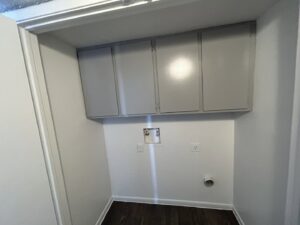 Newly installed electrical outlets and appliance hookups in a laundry room by Partners Electrical Services in Houston, TX.