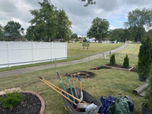 Lawn care tools and plants ready for a landscaping project by Sonner And Sons Lawncare in Fort Wayne, IN.